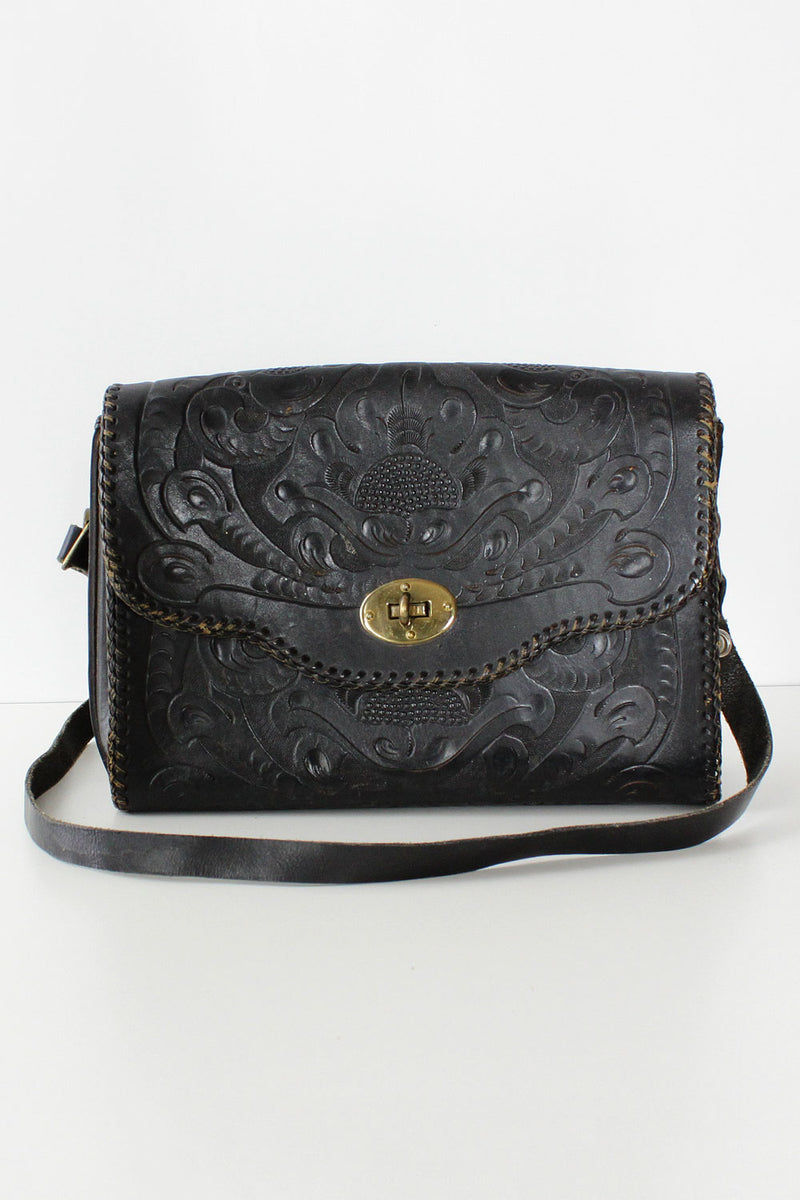 black tooled leather purse