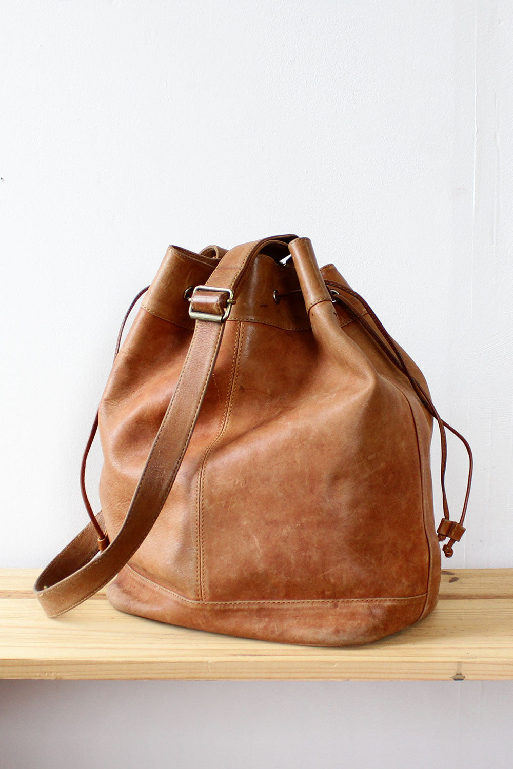 Chestnut Leather Bucket Sling Bag – OMNIA