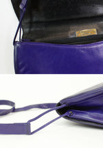 Charles Jourdan royal blue leather half moon crossbody bag