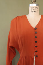 Burnt Orange Peplum Topper S/M