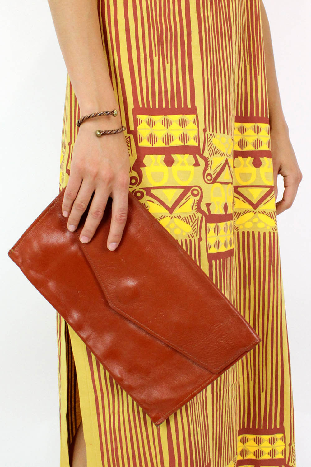 orange leather clutch