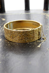 brass repousse hinge bangle