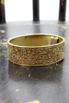 brass repousse hinge bangle