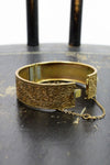 brass repousse hinge bangle