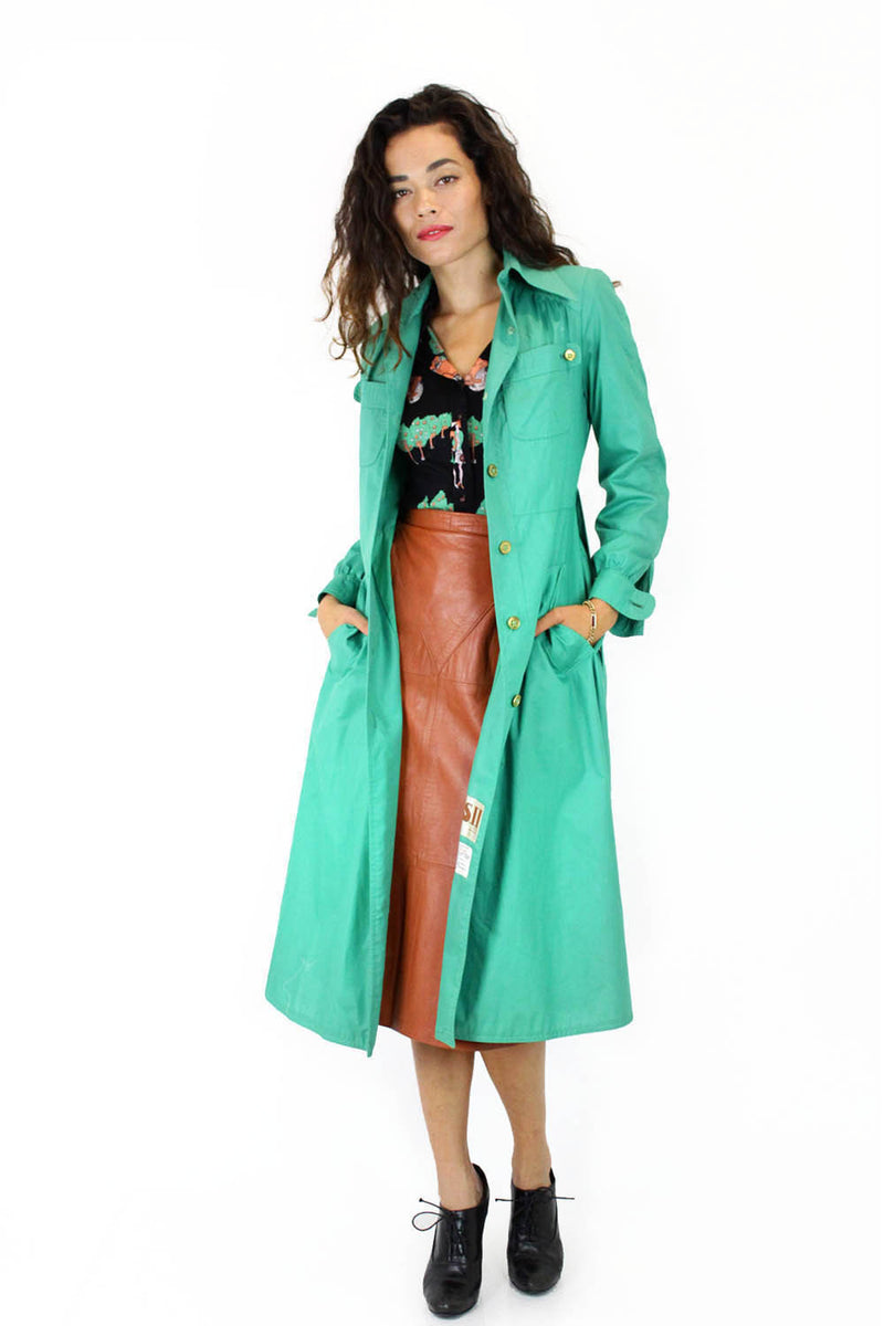 green trench coat