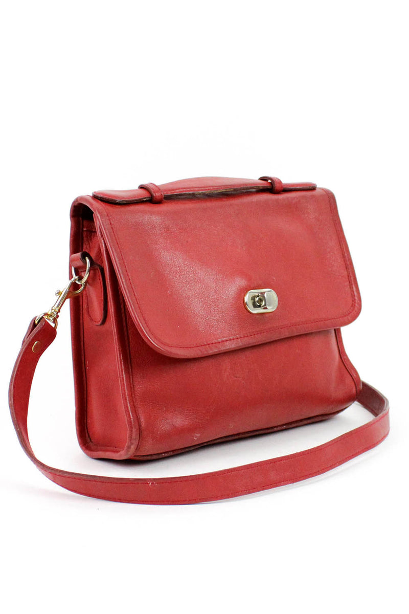 red coach style bags